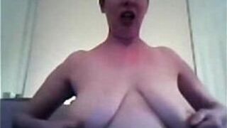 MILF playing with her huge natural boobs - porn video